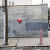 [UPDATE] Photos: Banksy's Broken Heart Balloon Floats In Red Hook